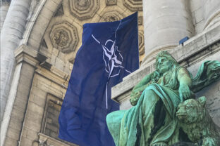 NATO flag between the arcades of the Cinquantenaire