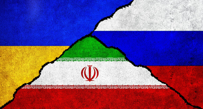 Russia, Ukraine and Iran flag together on wall.
