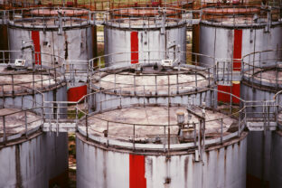 Pattern of old large oil storage tanks