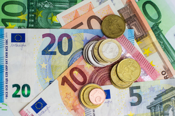 Euro bills and coins - cash money