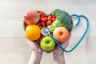 Nutritional food for heart health wellness by cholesterol diet and healthy nutrition eating with clean fruits and vegetables in heart dish by nutritionist and doctor recommended for patient well being