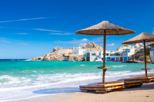 Beach and fishing village of Firapotamos on Milos island, Greece