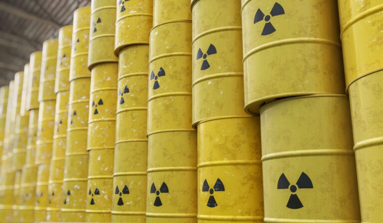 Dumping of radioactive waste barrels. 3D rendered illustration.