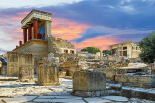 Knossos palace at Crete, Greece Knossos Palace, is the largest Bronze Age archaeological site on Crete and the ceremonial and political centre of the Minoan civilization and culture.