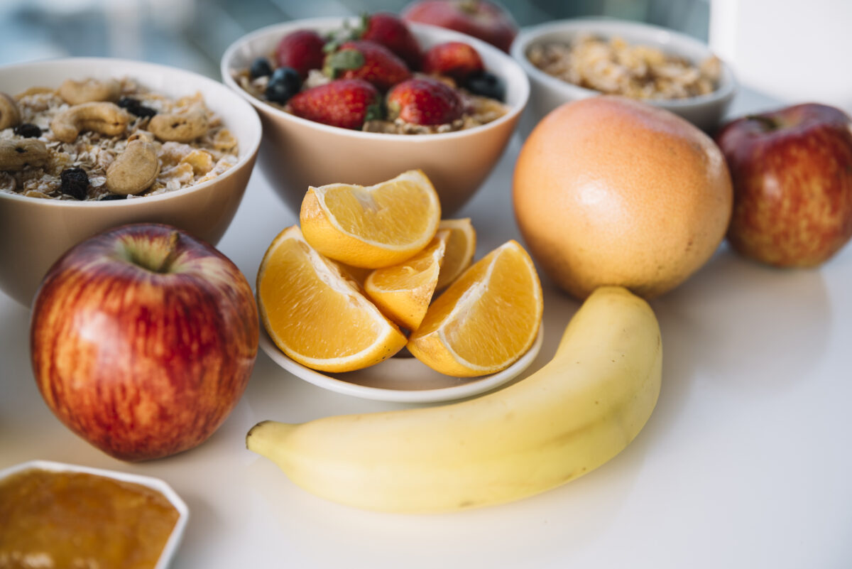 Oatmeal with fruits berries white table.jpg