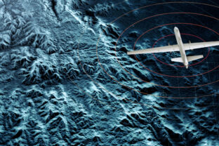 Satellite view of a military drone flying over a war zone, war operations, night vision