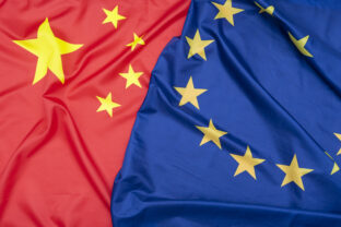 Real natural fabric flag of China or National Flag of the People's Republic of China and EU European Union flag as texture or background