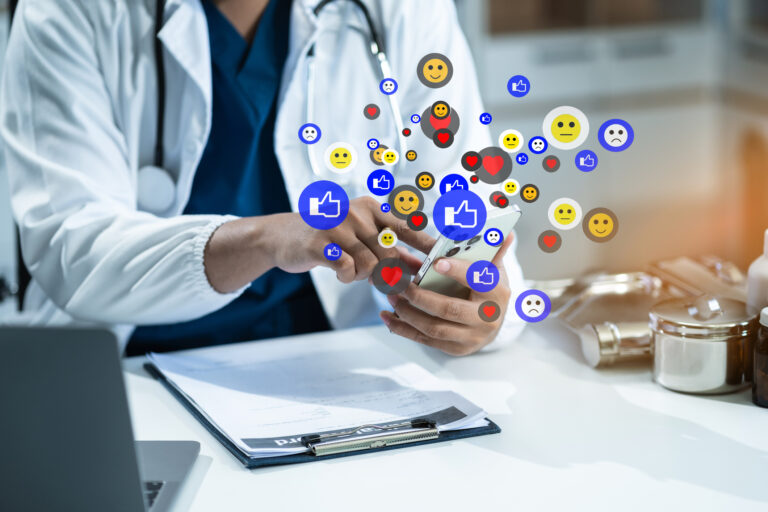 Doctor are using smartphonet to Social media at morning light.