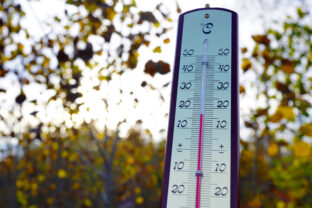 Thermometer for measuring outdoor air temperature. Cold weather in winter season.