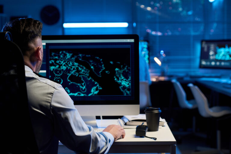 Officer in uniform using computer