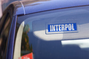 Interpol - Car sun visor sign