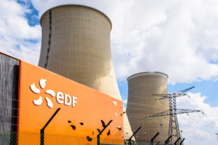 EDF sign and cooling towers of the nuclear power plant of Nogent sur Seine, France.