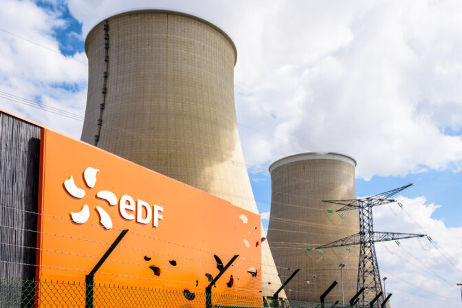 EDF sign and cooling towers of the nuclear power plant of Nogent sur Seine, France.