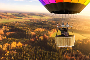 Aerial view from a hot air balloon with loving couple