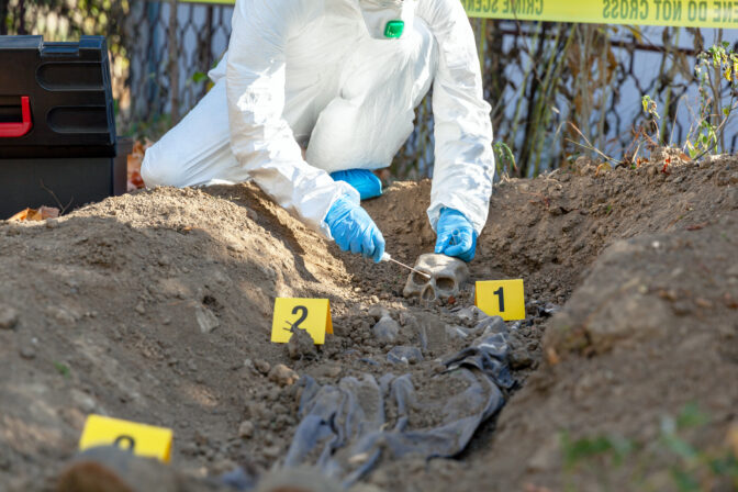 War crime investigation. Forensic science specialist at work.