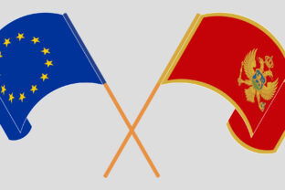 Crossed and waving flags of the European Union and Montenegro