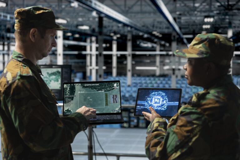 Team of army experts analyzing missiles flight paths with deep learning