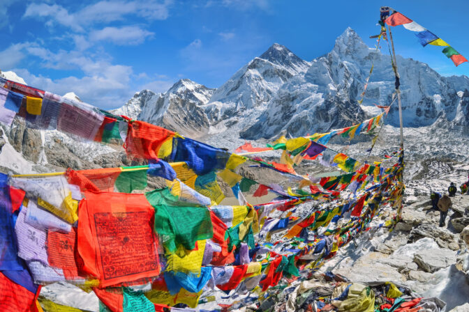 View of Mount Everest and Nuptse  with buddhist prayer flags