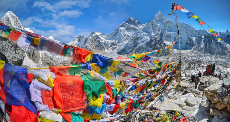View of Mount Everest and Nuptse  with buddhist prayer flags