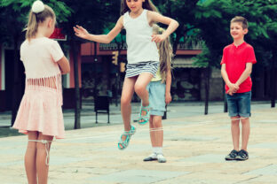 Children with chinese jumping rope