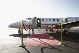Private airplane with red carpet
