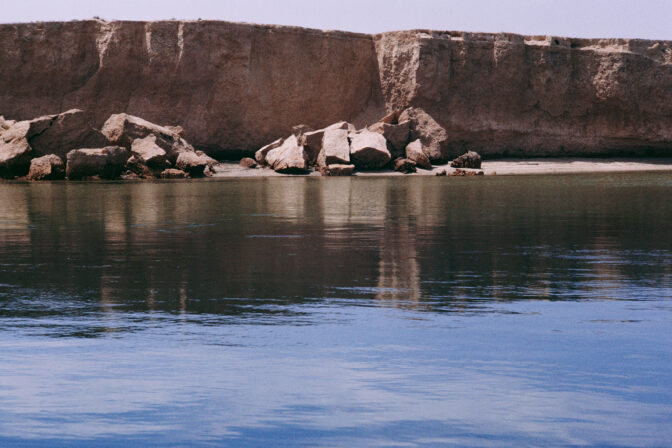 Eroding sandstone cliff on seashore