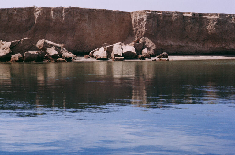 Eroding sandstone cliff on seashore