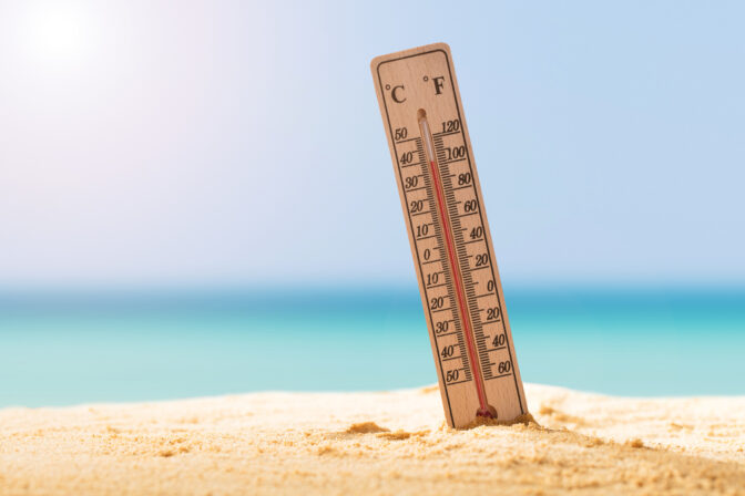 Close up Of Thermometer On Sand