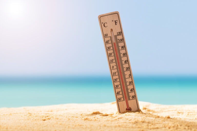 Close up Of Thermometer On Sand