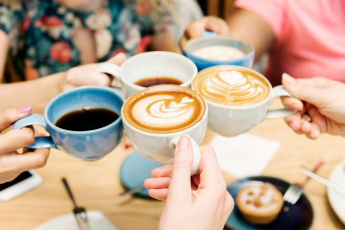 Friends having coffee together