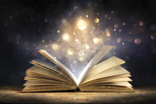 Magic Book With Glitter - Open Book With Lights Glowing In Dark Background