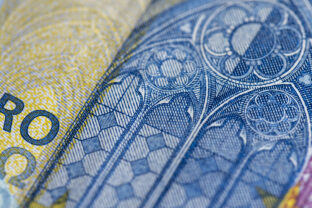Details of the new blue twenty euro of the European Union , part of the genuine 20 euro blue banknote, close up