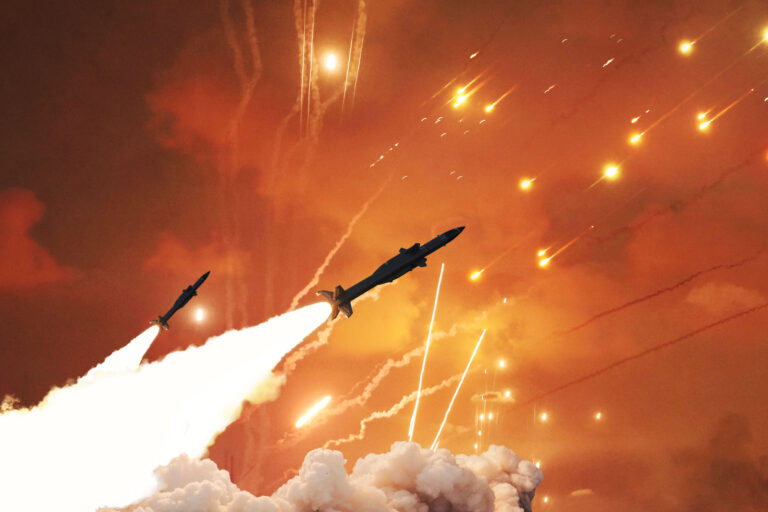 Dramatic, explosive night combat scene showing several missiles being launched with intense fire plumes and smoke, amidst a sky illuminated by enemy flak, tracers, and flares.
