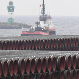 Pipes for the Nord Stream 2 Baltic Sea gas pipeline are stored on the premises of the port of Mukran near Sassnitz, Germany, Friday, Dec. 4, 2020. The port of Mukran on the island of Ruegen is considered the most important transhipment point for the construction of the pipeline. ()