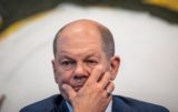 Chancellor Olaf Scholz (SPD) attends the press conference following the deliberations of the SPD, Greens and FDP in the coalition committee in Berlin, Germany, Sunday, Sept. 4, 2022. The coalition committee of the traffic light alliance has agreed on a new relief package for citizens