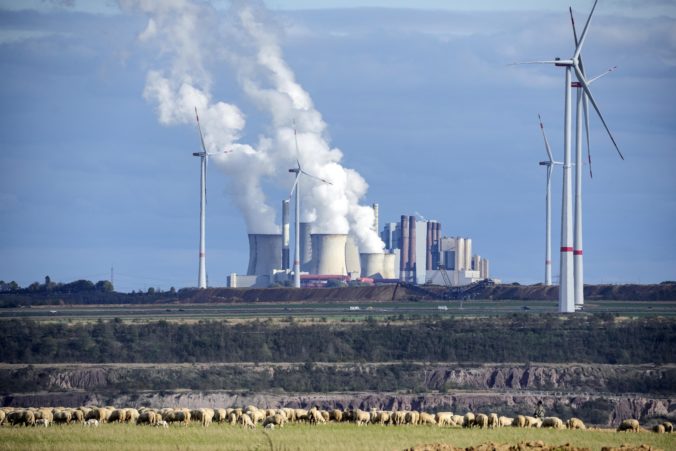 COP27 Climate Ukraine War A flock of sheep graze in front of a coal-fired power plant at the Garzweiler open-cast coal mine near Luetzerath, western Germany, Sunday Oct. 16, 2022. About 1,000 miles away from Ukraine, Luetzerath is an indirect victim of the war as the town will soon make way for the expansion of a nearby coal mine. Environmentalists have been up in arms about the decision which would pump millions more tons of planet-warming carbon dioxide into the air