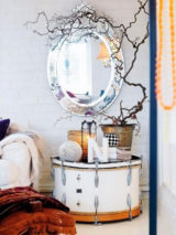 Bedroom mirror in bedroom with small table decoration.jpg