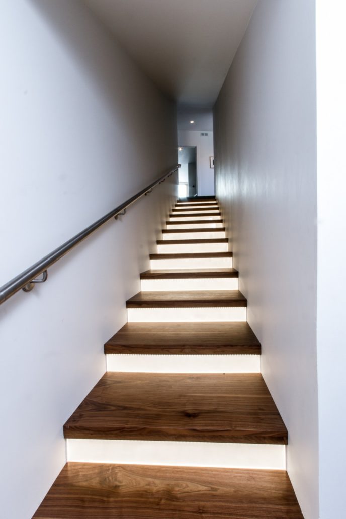 Elegant wooden staircase design with modern led lighting style.jpg