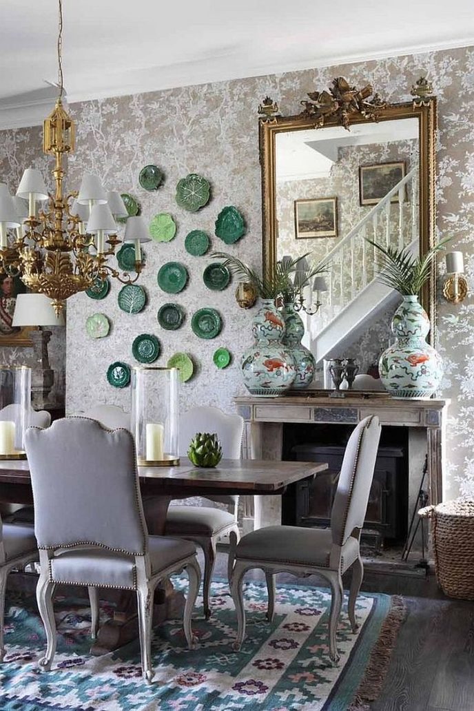 Floral wallpaper from ralph lauren sets the tone for a stylish shabby chic dining space.jpg