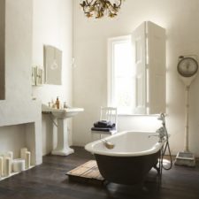 Vintage bathroom with a matching chandelier.jpg