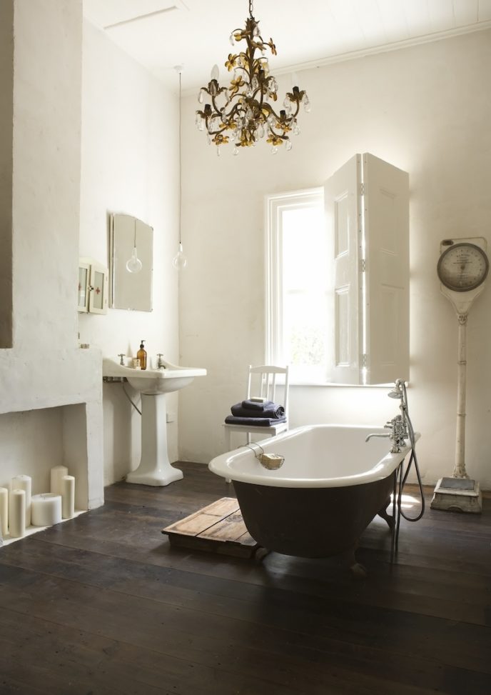 Vintage bathroom with a matching chandelier.jpg