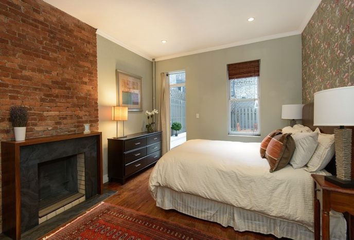 Contemporary guest bedroom with brick fireplace i_g is prtlq3z9sehp xtobp.jpg