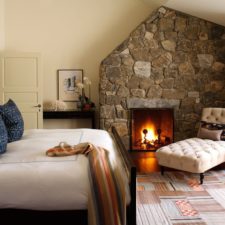 Cottage guest bedroom with stone fireplace i_g is 15a1lxj96nwbh xceck.jpg