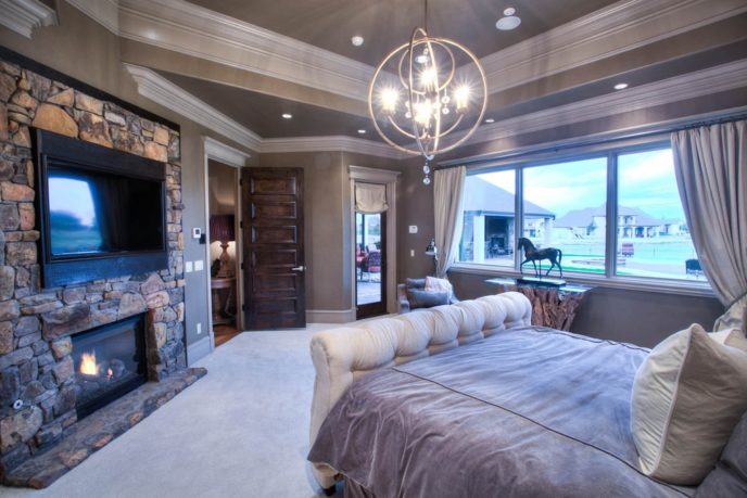 Eclectic master bedroom with stone fireplace i_g isp1up51phkjfk1000000000 2mun1.jpg