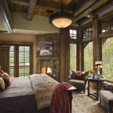 Post_country master bedroom with french doors stone fireplace and reclaimed wood i_g is1bxf7sptd7ow1000000000 layj7.jpg