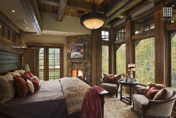 Post_country master bedroom with french doors stone fireplace and reclaimed wood i_g is1bxf7sptd7ow1000000000 layj7.jpg