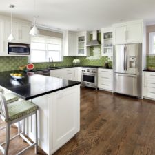 Traditional kitchen with hardwood flooring white cabinets and glass wall i_g is prql6r3vsmsd 2ly40.jpg