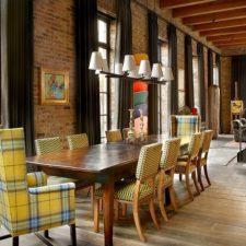 Post_chairs add a touch of yellow to the industrial dining room.jpg