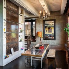 Post_custom crafted dining table steals the show in this loft dining room.jpg