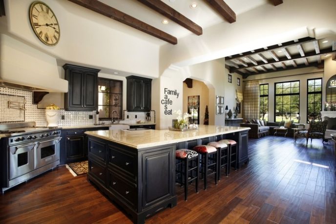 Post_eclectic kitchen with hardwood flooring and black cabinets i_g isywojteo8ydur kubo0.jpg